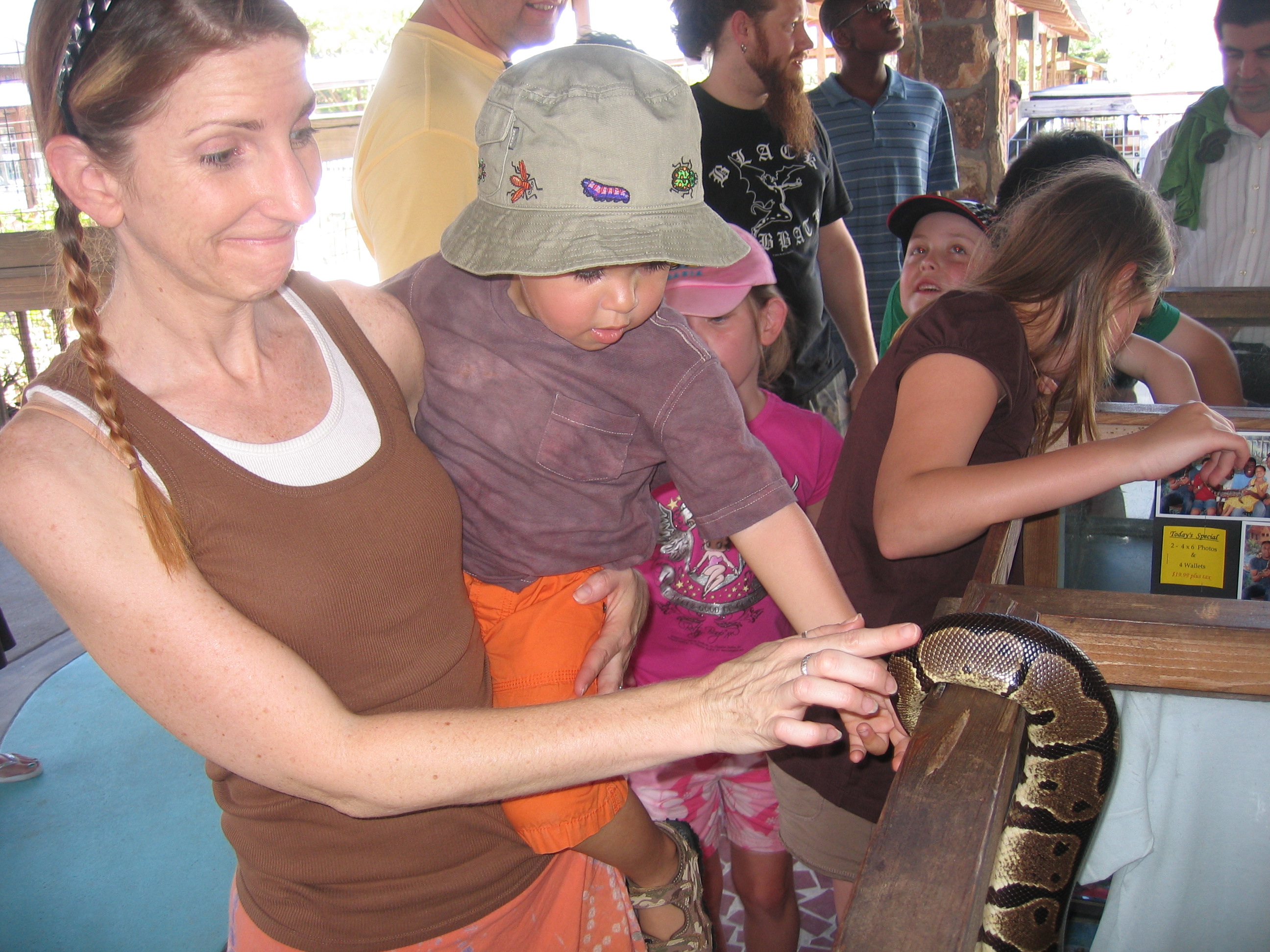 "Mommy...pllleeeaase touch the snake with me. Don't be afraid...I'll protect you!"