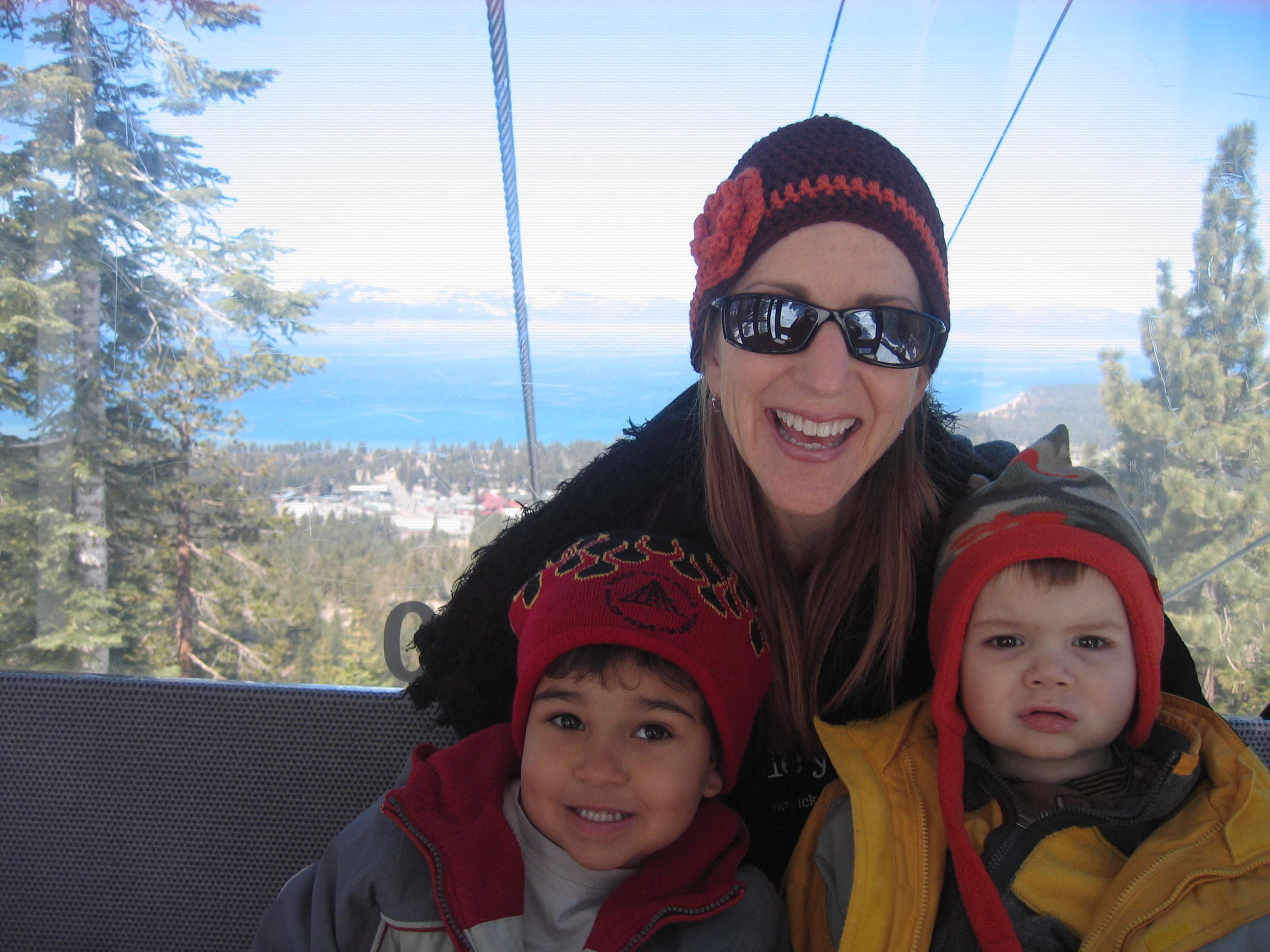 Riding the gondola up the mountain, Lake Tahoe behind us...OK, so the view was worth at least 10 bucks. We still have to justify 20 more dollars each.