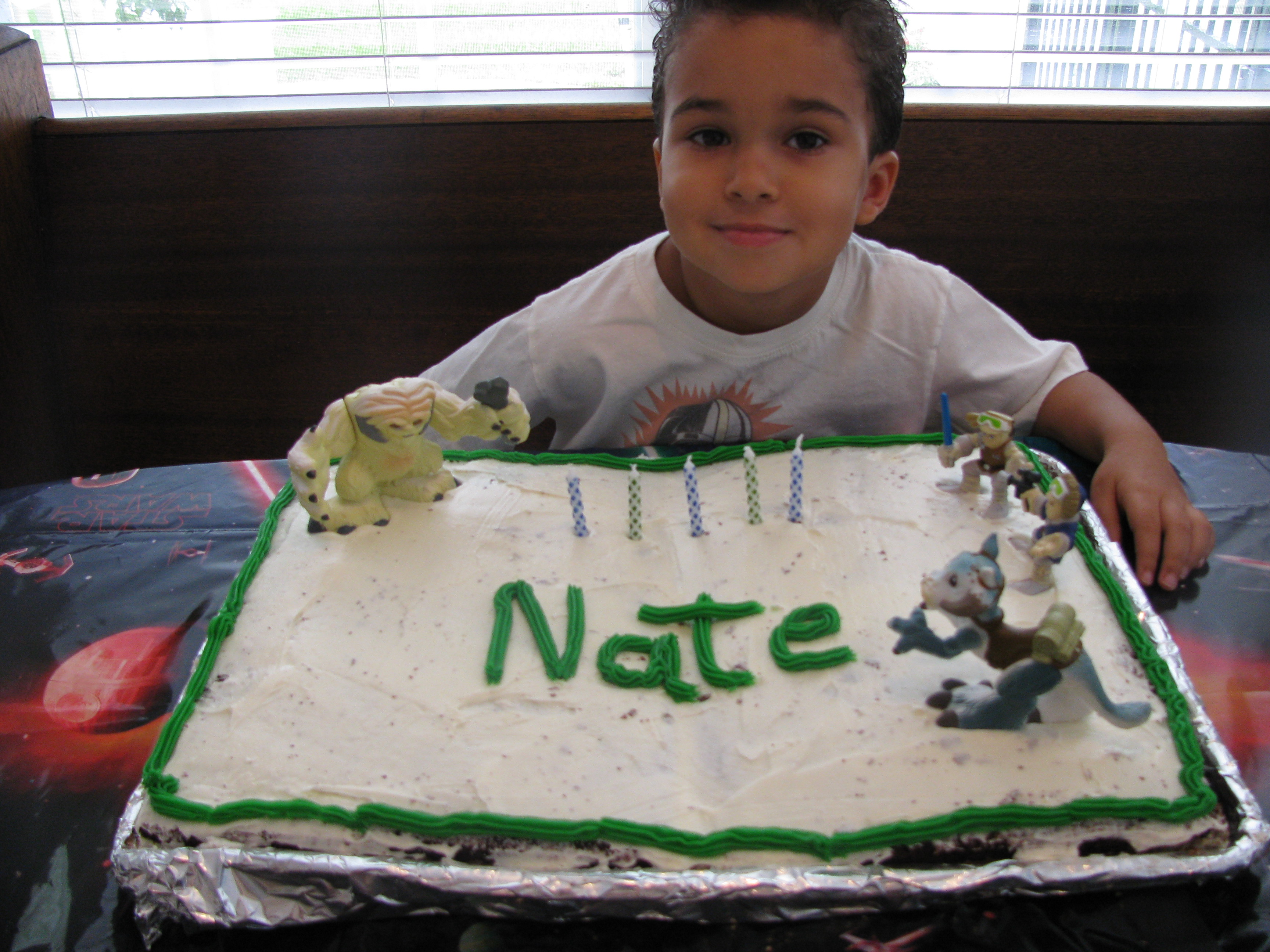 Nate chose the white frosting because it "looks like snow" and he wanted to create the snow-something attacking Luke while he's riding on that kangaroo-looking creature.